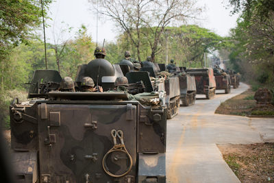 Soldiers with weapons on military combat training