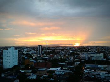 High angle view of city at sunset