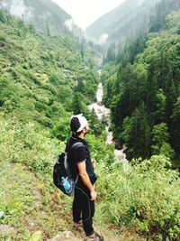 Full length of man climbing on mountain