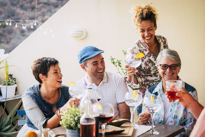 Happy family having drink in restaurant