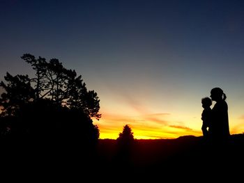 Silhouette of man at sunset