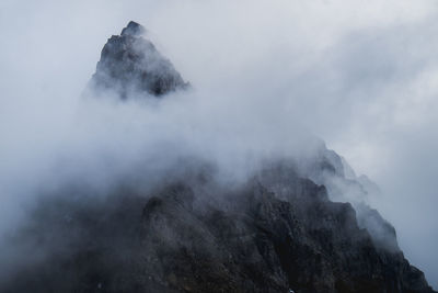 Scenic view of volcanic mountain against sky