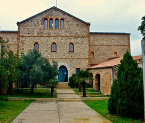 Entrance of historic building against sky