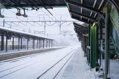 Train at railroad station during winter