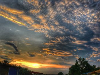 Scenic view of cloudy sky at sunset