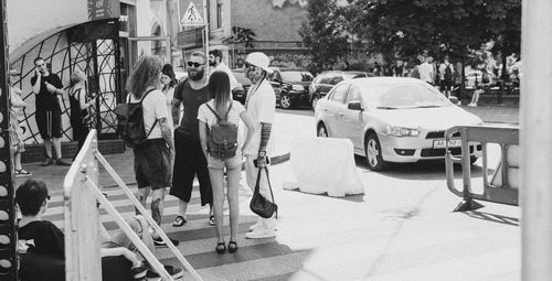 People on street in city