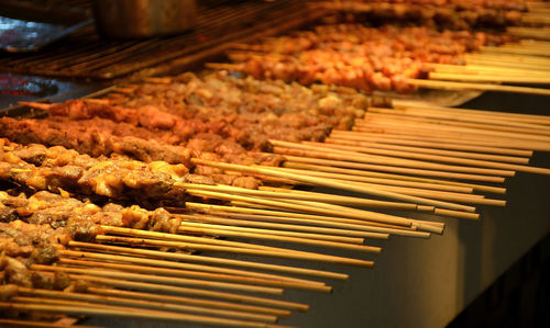 High angle view of meat on barbecue