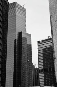 Low angle view of skyscrapers against clear sky