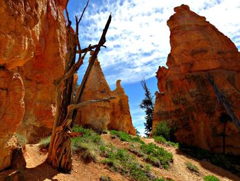 Panoramic view of rock formations against sky