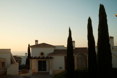 Low angle view of buildings against clear sky