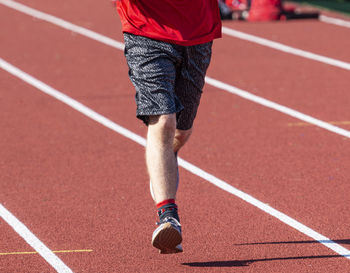 Low section of man running