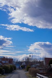 Road against cloudy sky