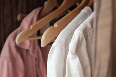 Close-up of clothes hanging in store