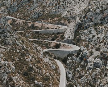 High angle view of road amidst rocks