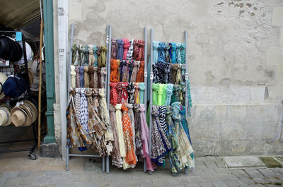 Various clothes for sale at market stall