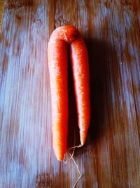 High angle view of odd shaped carrot on table