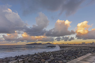 Scenic view of sea against sky during sunset