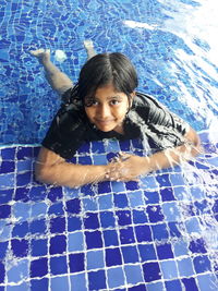 Portrait of girl in swimming pool