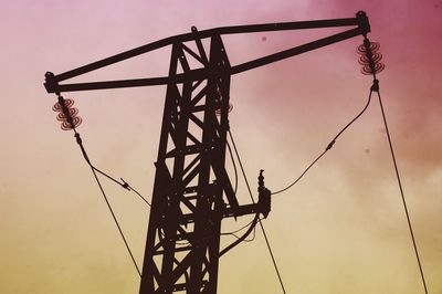 Low angle view of electricity pylon
