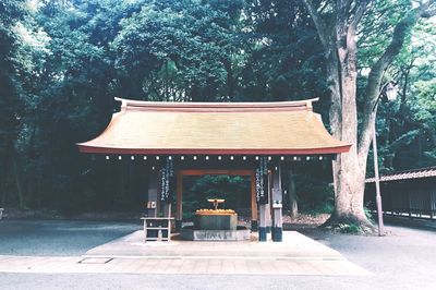 Entrance of temple against building