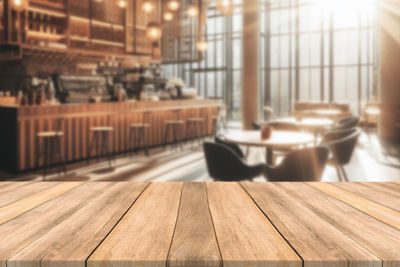 Close-up of wooden table at home