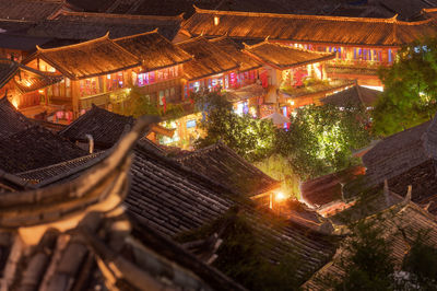 High angle view of illuminated buildings at night