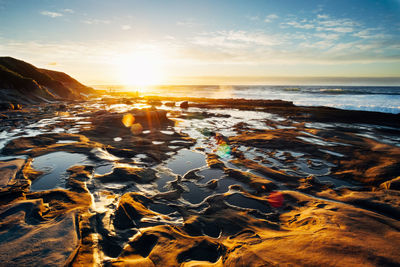 Scenic view of sunset over sea