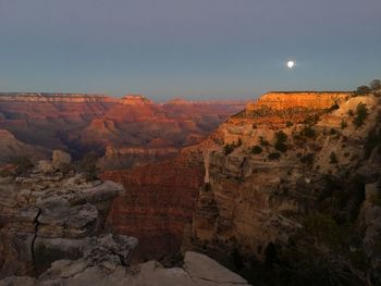 Scenic view of cliff against sky