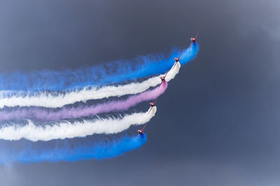 Airshow with multi colored vapor trails