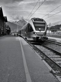 Railroad track against sky