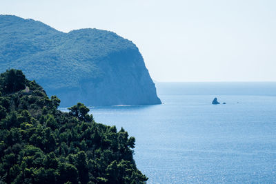 Scenic view of sea against clear sky