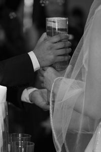 Close-up of woman holding hands