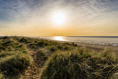 Scenic view of sea against sky during sunset