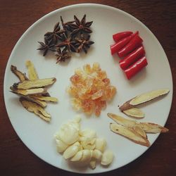 High angle view of fruits in plate on table