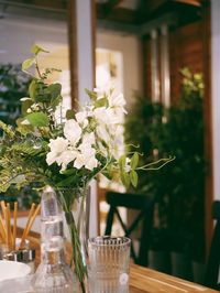 Flower vase on table