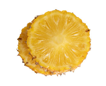 High angle view of lemon slice against white background