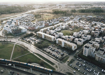 High angle view of street amidst buildings in city