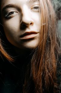 Close-up portrait of young woman