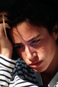 Close-up of thoughtful woman