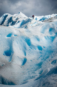 Scenic view of snowcapped mountain against sky