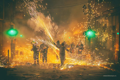 View of firework display at night