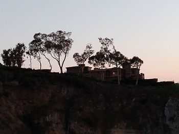 Low angle view of old building against clear sky