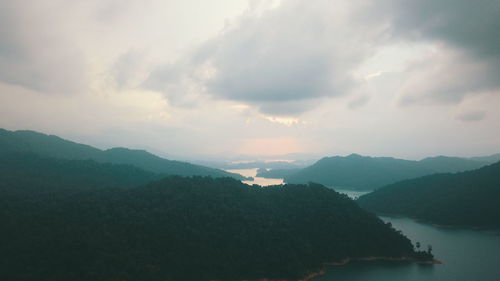 Scenic view of mountains against sky during sunset