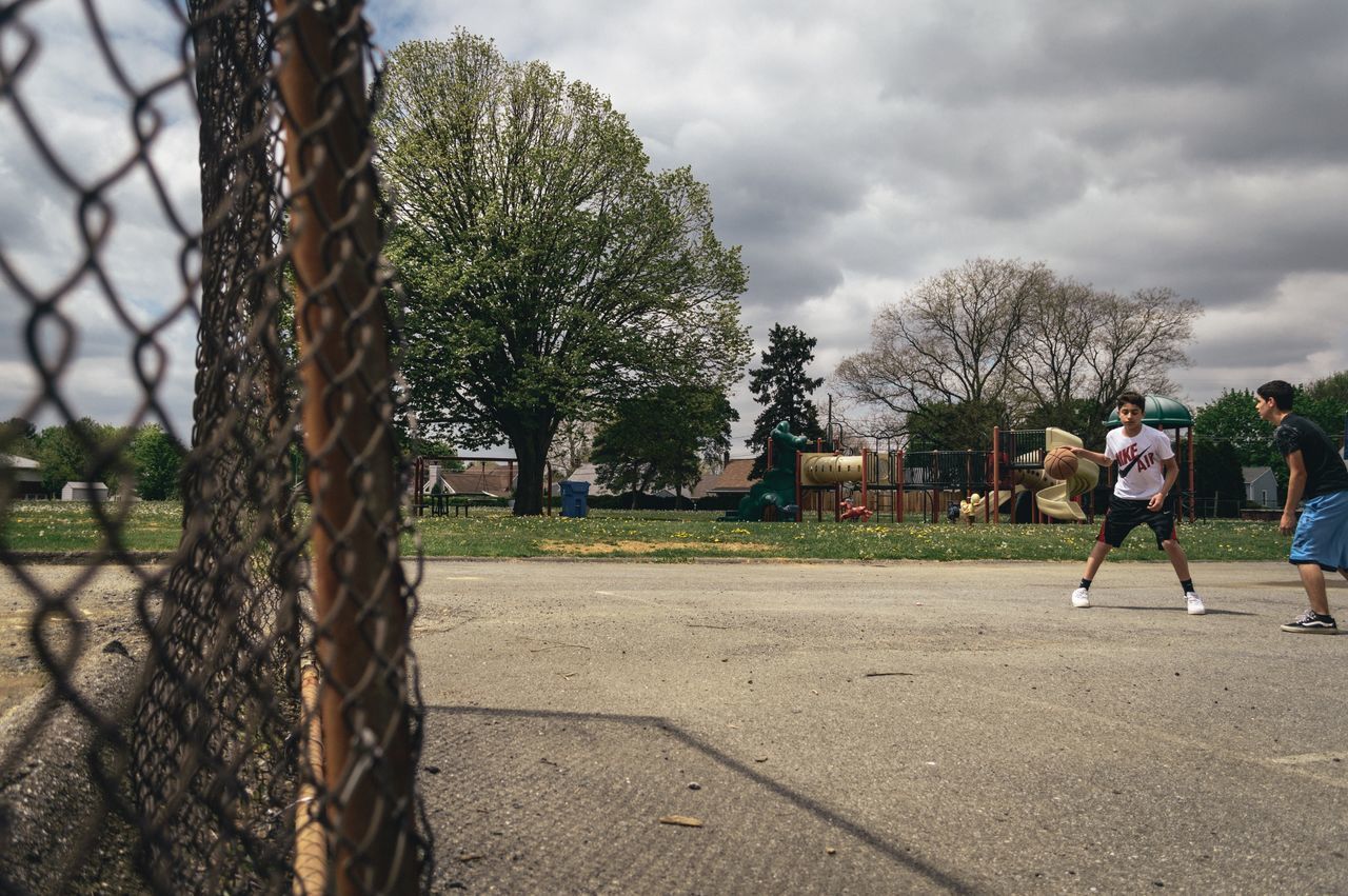 GROUP OF PEOPLE PLAYING SOCCER