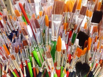 Full frame shot of brushes for sale at market