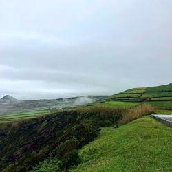 Scenic view of land against sky