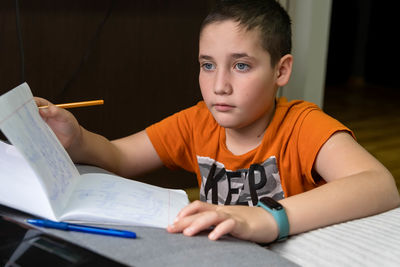 Boy studying at home