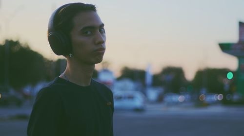 Portrait of young man looking away