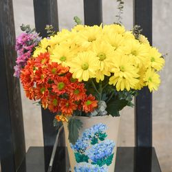 Close-up of flowers in vase on table