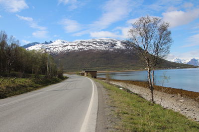 Country road with mountains in background